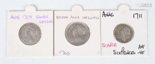 A group of three Anne silver coins, comprising two shillings...