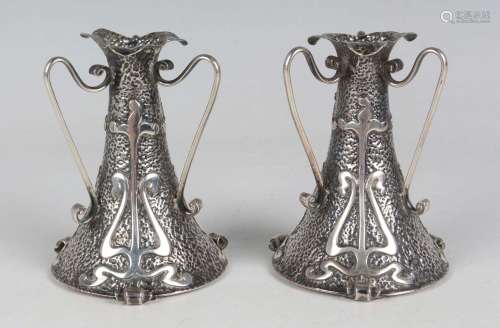 A pair of Art Nouveau silver posy vases, each of tapered cyl...