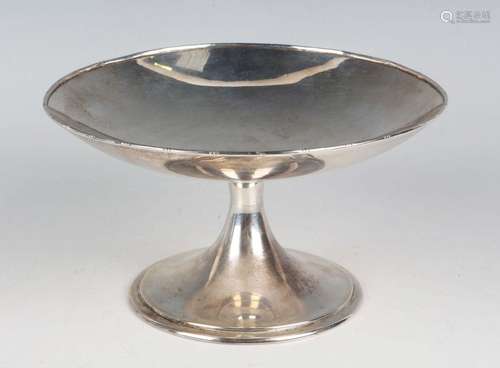 An Edwardian silver circular tazza on a flared stem and circ...