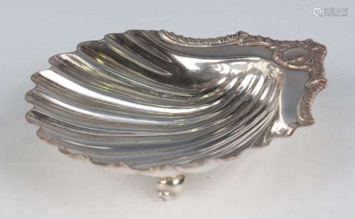A George III silver scallop shell butter dish with gadrooned...