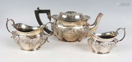 An Edwardian silver harlequin bachelor's three-piece tea set...