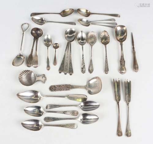 A set of four George III silver bright cut engraved teaspoon...