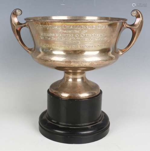 An Edwardian silver two-handled trophy cup of squat urn form...