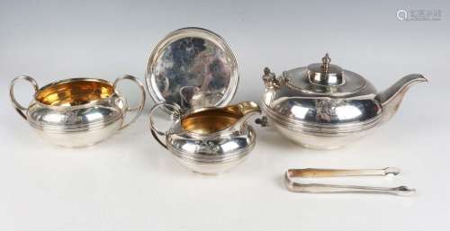 A George III harlequin silver four-piece tea set of squat ci...