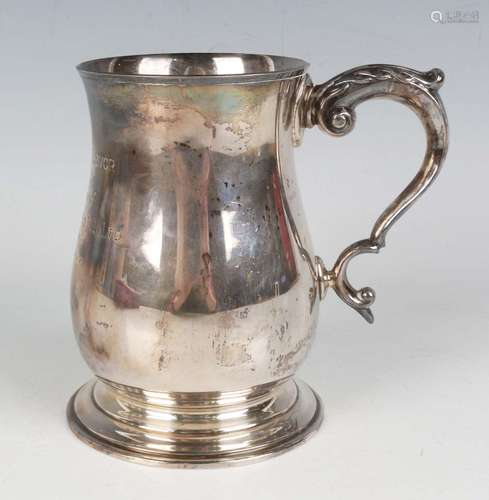 An Elizabeth II silver baluster tankard, inscription engrave...