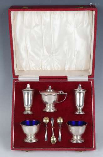 An Elizabeth II silver five-piece condiment set, comprising ...