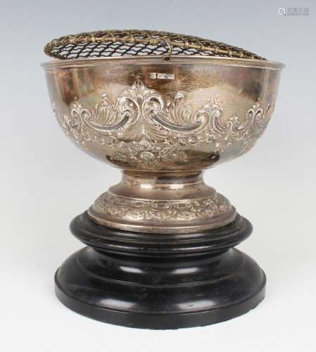 An Edwardian silver circular rose bowl, embossed with a cont...