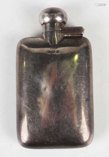 A George V silver curved rectangular hip flask with screw hi...