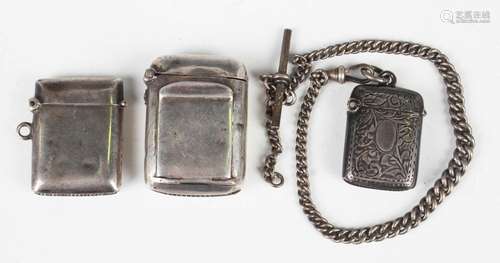 A George V silver vesta case, the front with a hinged stamp ...