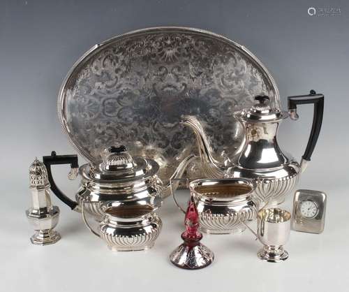 A group of plated items, including a four-piece tea set, an ...