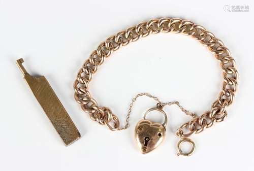 A gold curblink bracelet, the links detailed '9c', weight 13...