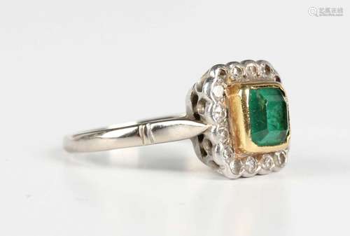 A two colour gold, emerald and diamond square cluster ring, ...