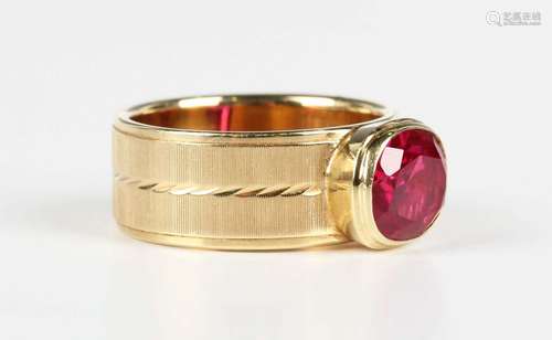 A gold and synthetic ruby single stone band ring, detailed '...