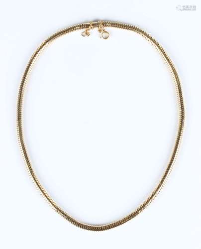 An 18ct gold necklace in a Brazil link design, on a cylindri...