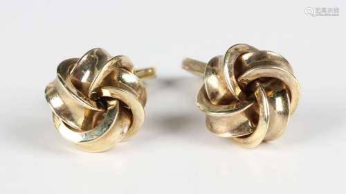 A pair of German cufflinks, the fronts in a woven knot desig...