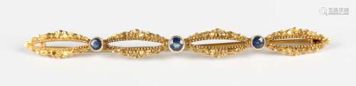 A gold and sapphire brooch, designed as four oval openwork m...