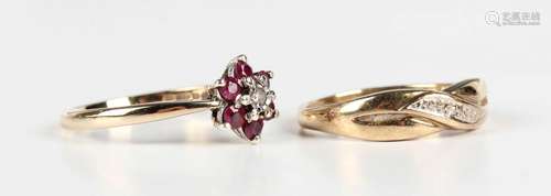 A 9ct gold, ruby and diamond seven stone cluster ring, mount...