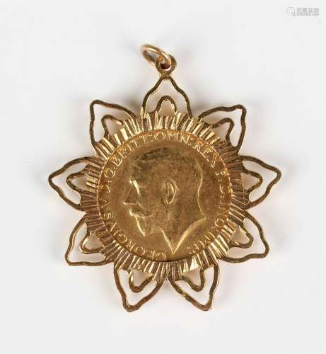 A George V sovereign 1915 in a 9ct gold pendant mount, weigh...