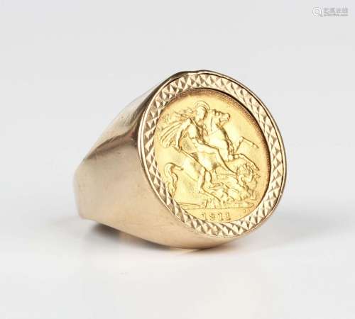 A George V half-sovereign 1911 in a 9ct gold ring mount, wei...