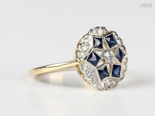 A gold, sapphire and diamond cluster ring, collet set with t...