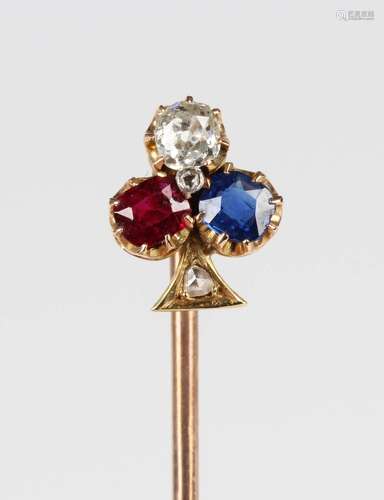 A gold topped, ruby, sapphire and diamond stickpin, the fini...