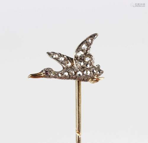 A gold, silver set and diamond stickpin, the finial designed...