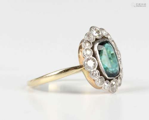 A gold, diamond and green tourmaline cluster ring, mounted w...