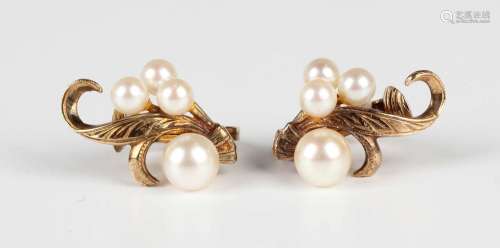 A pair of 9ct gold mounted cultured pearl earclips, each in ...