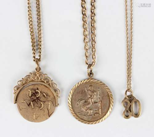 A 9ct gold St Christopher pendant, length 3cm, with a 9ct go...