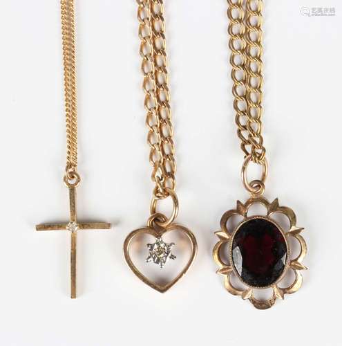 A 9ct gold pendant, mounted with an oval cut garnet, length ...