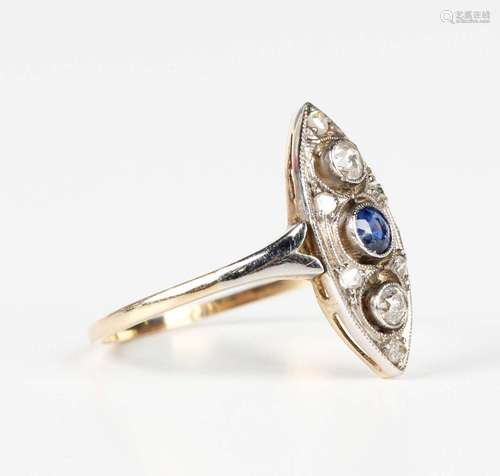 A gold, diamond and sapphire ring in an openwork marquise sh...