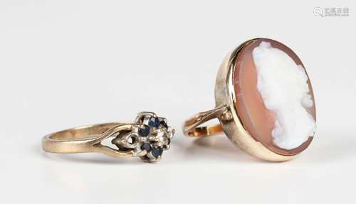 A gold mounted oval sardonyx cameo ring, carved as a portrai...