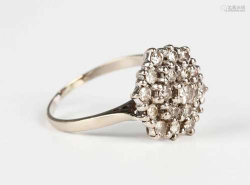 A white gold and diamond set hexagonal cluster ring, claw se...