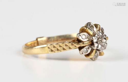 An 18ct gold and diamond seven stone cluster ring, Birmingha...