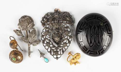 A drop shaped pendant with detachable surmount, 19th century...