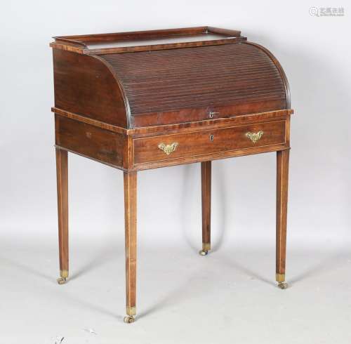 A George III mahogany roll-top gentleman's writing desk