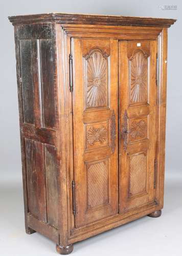 A 17th century French oak armoire