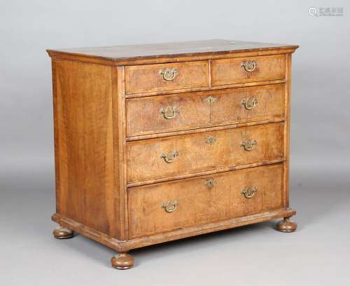 A Queen Anne walnut chest of oak-lined drawers