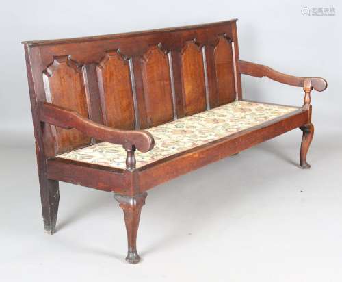 A late 18th century oak settle