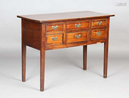 An 18th century provincial oak and fruitwood crossbanded sid...