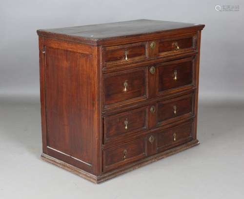 A William and Mary oak chest of four drawers with applied ed...