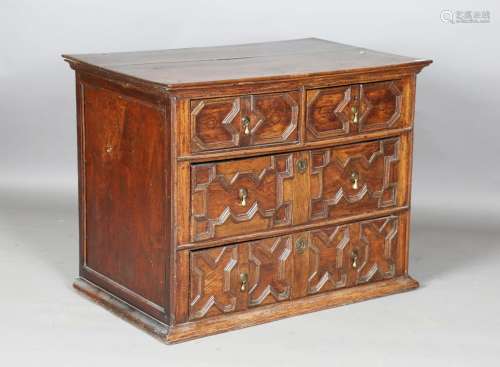A William and Mary oak chest of three drawers with applied g...