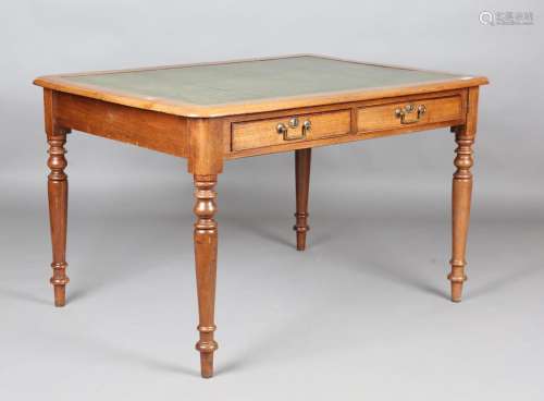 A Victorian mahogany library table