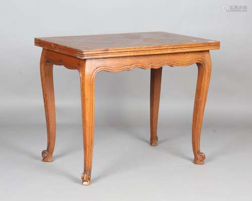 A 20th century French parquetry oak fold-over breakfast tabl...