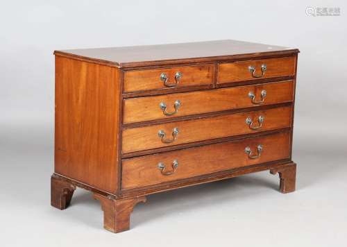 A 20th century George III style mahogany low chest of drawer...