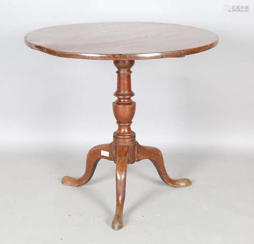 A George III mahogany circular tip-top supper table