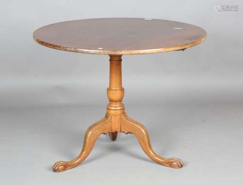 A 19th century mahogany circular tip-top supper table