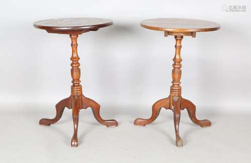 A pair of 20th century Victorian style hardwood tip-top wine...