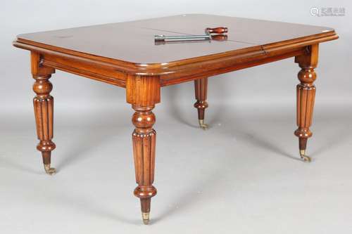 An early Victorian mahogany extending dining table