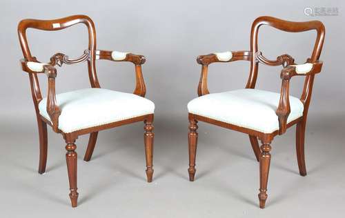 A harlequin set of ten Victorian and later spoon back dining...